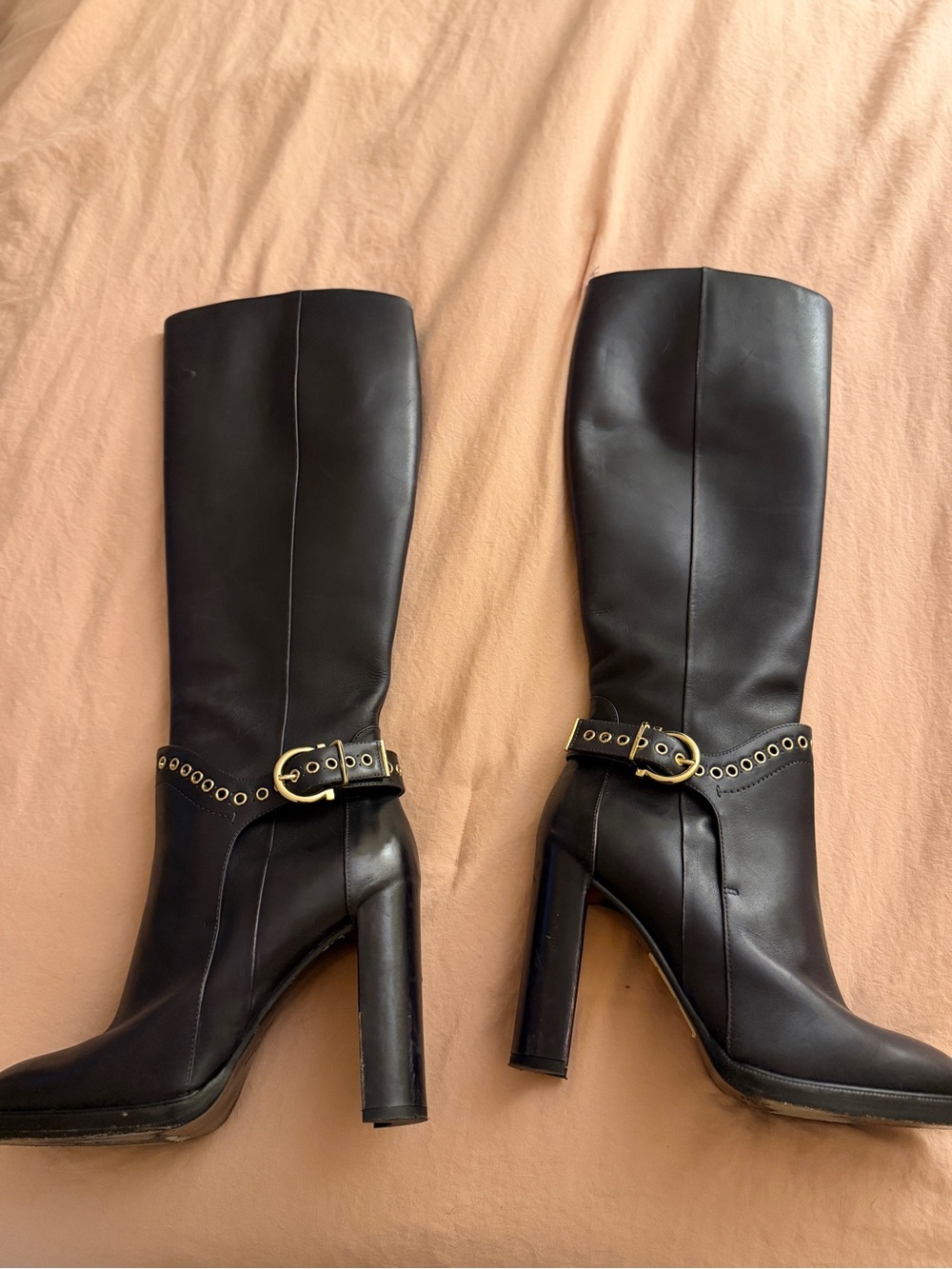 Gold and black ferragamo boots